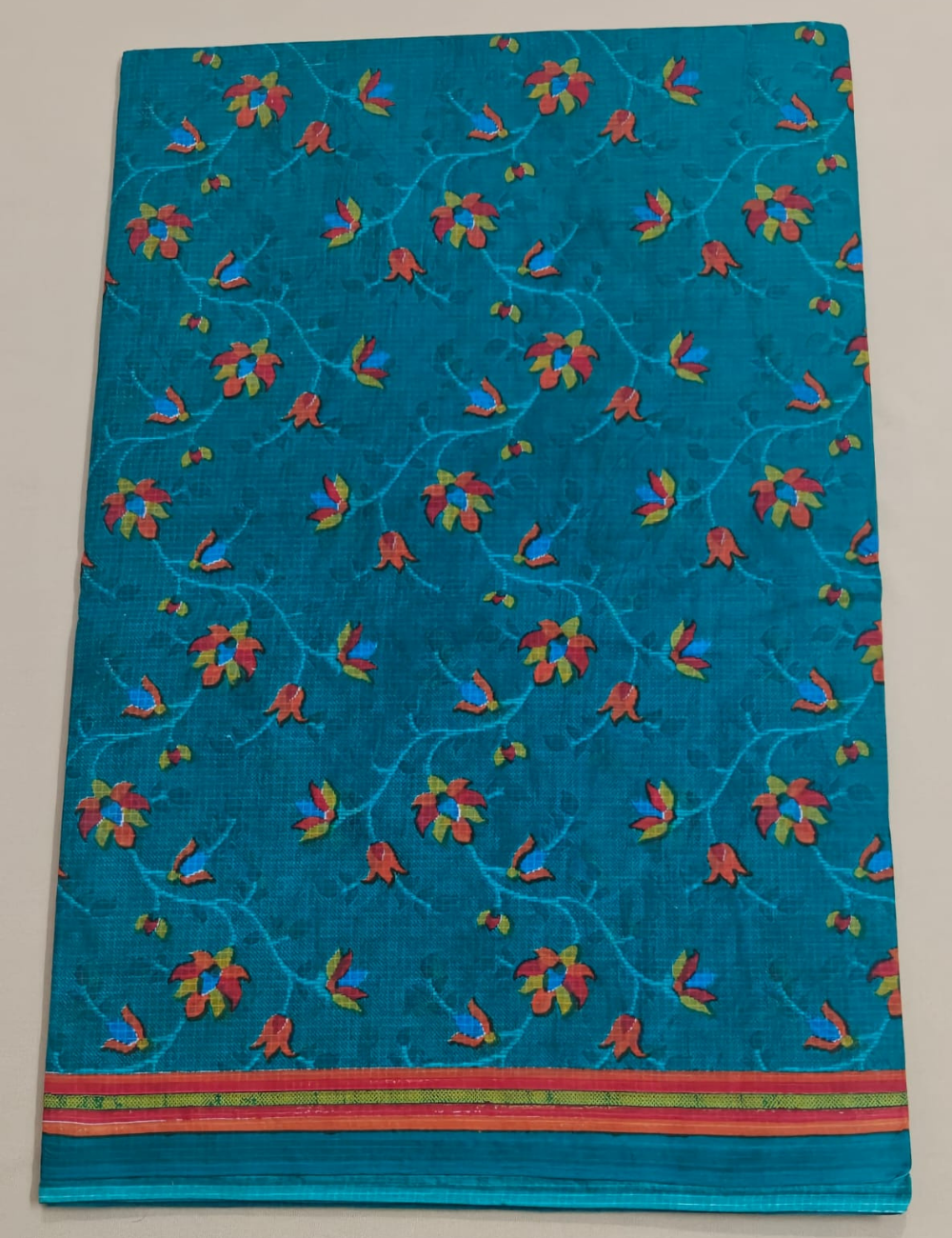Elegant Teal Blue Floral Printed Sari with Contrast Border
