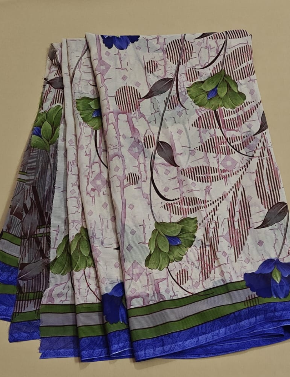 Elegant Cream Floral Printed Saree with Royal Blue Border