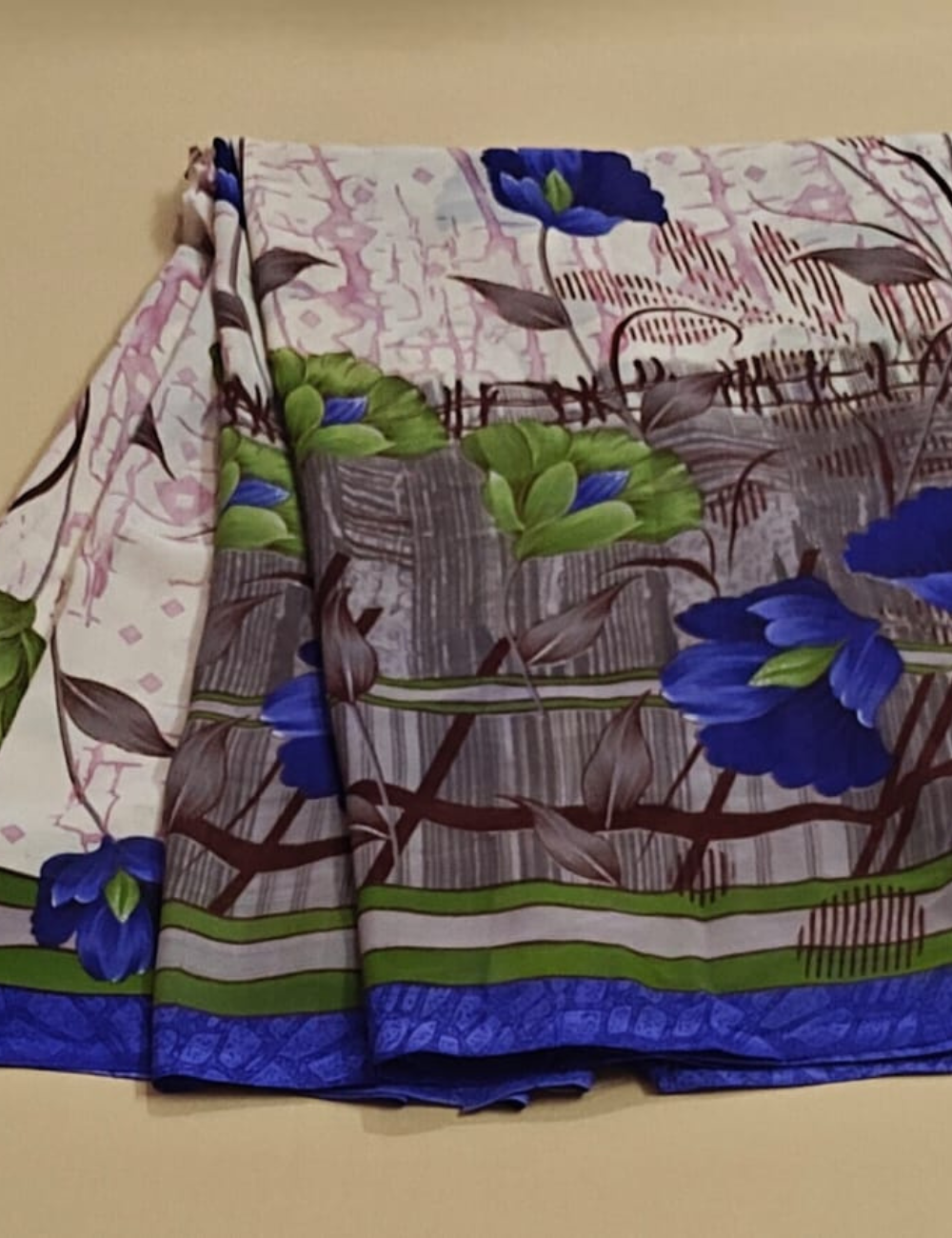 Elegant Cream Floral Printed Saree with Royal Blue Border
