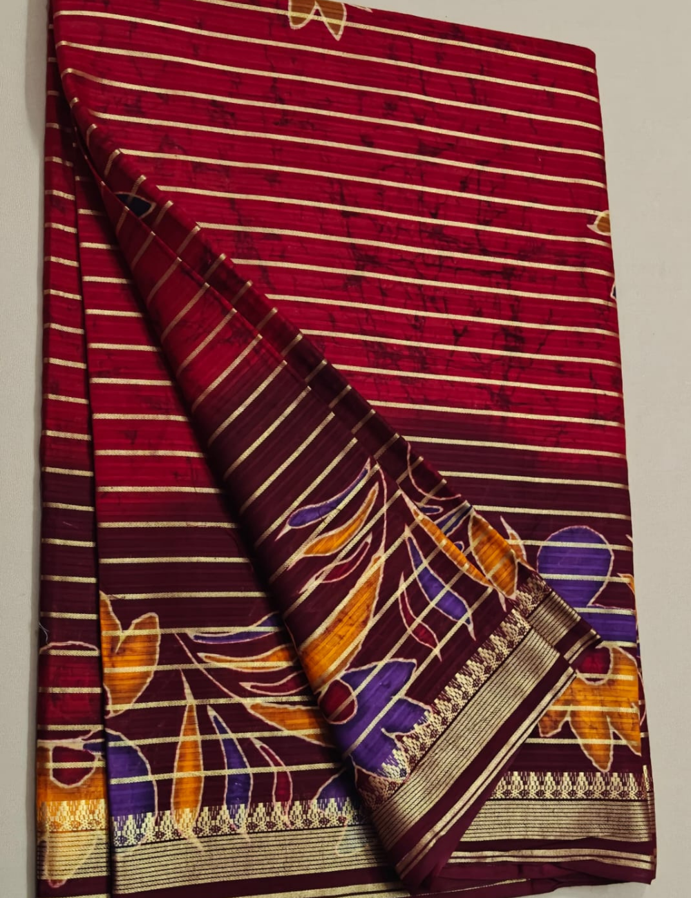 Elegant Maroon Floral Printed Sari with Golden Stripe Border