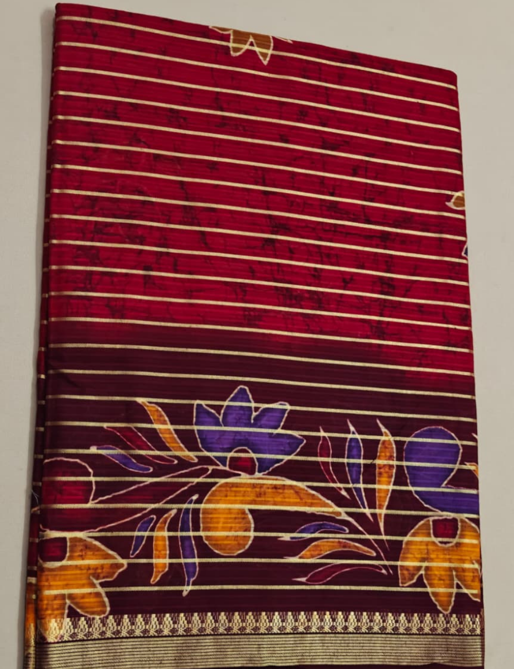 Elegant Maroon Floral Printed Sari with Golden Stripe Border