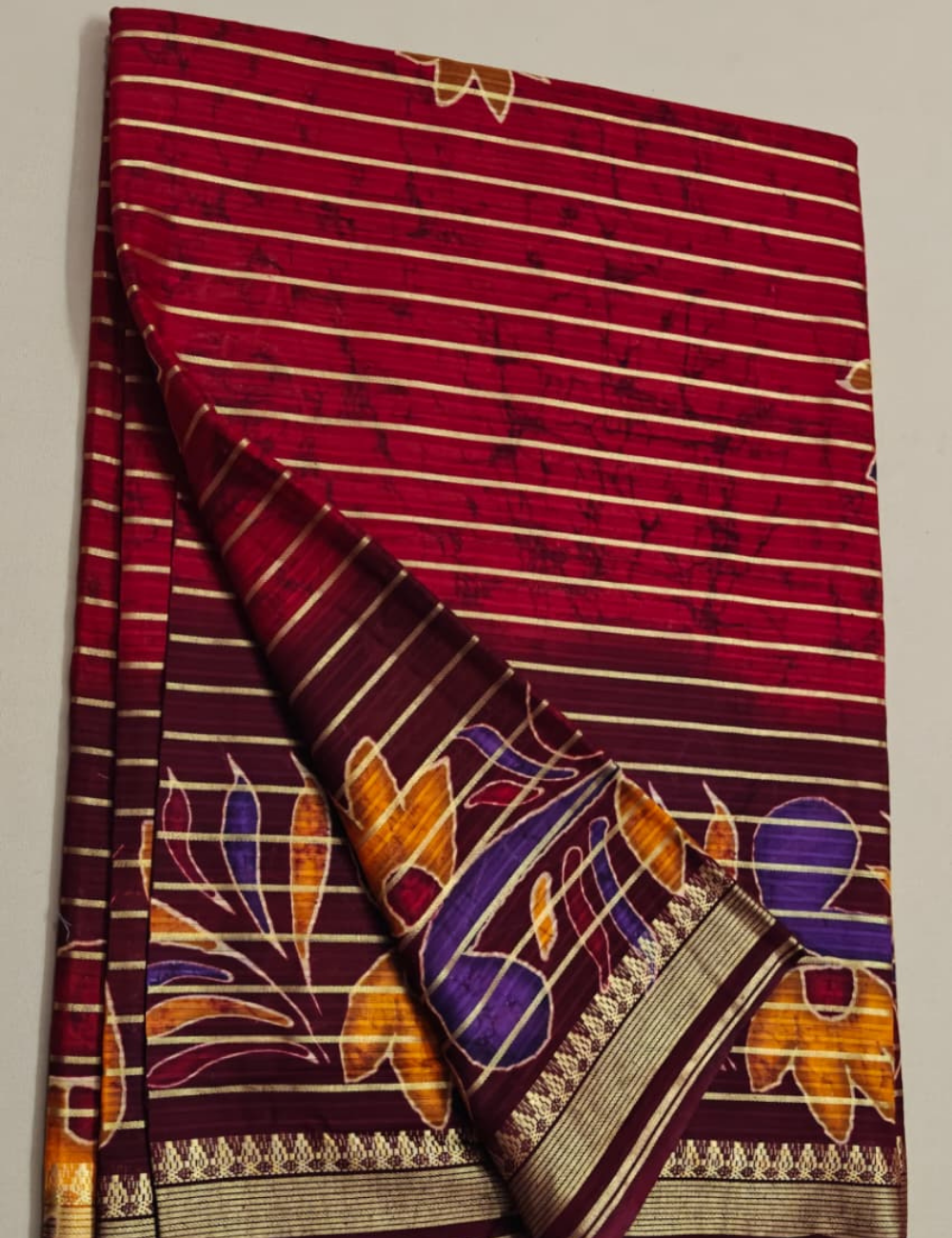 Elegant Maroon Floral Printed Sari with Golden Stripe Border